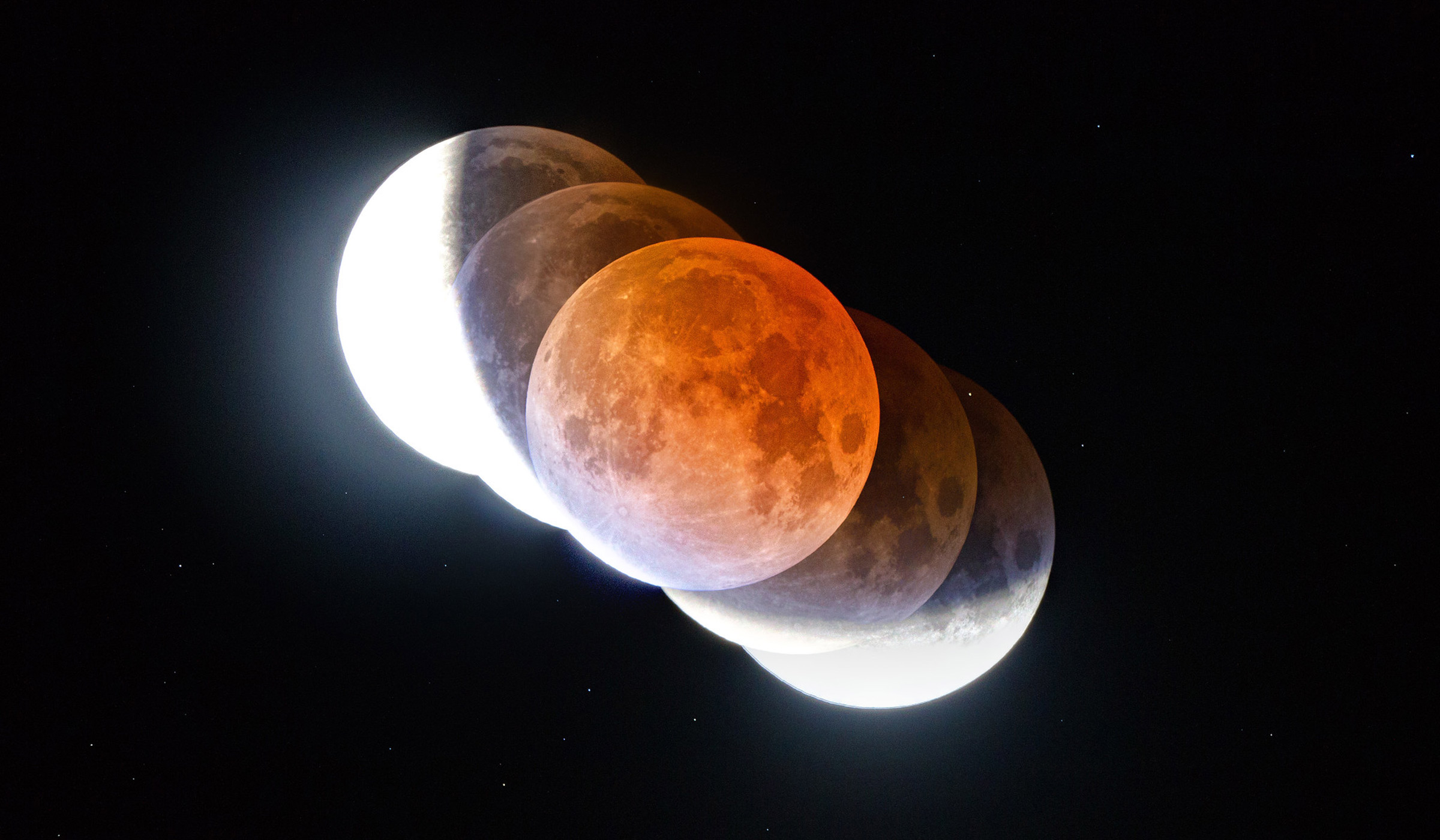 Composite of five photos taken of the moon during the lunar eclipse, showing part of the moon inside the earth's shadow.