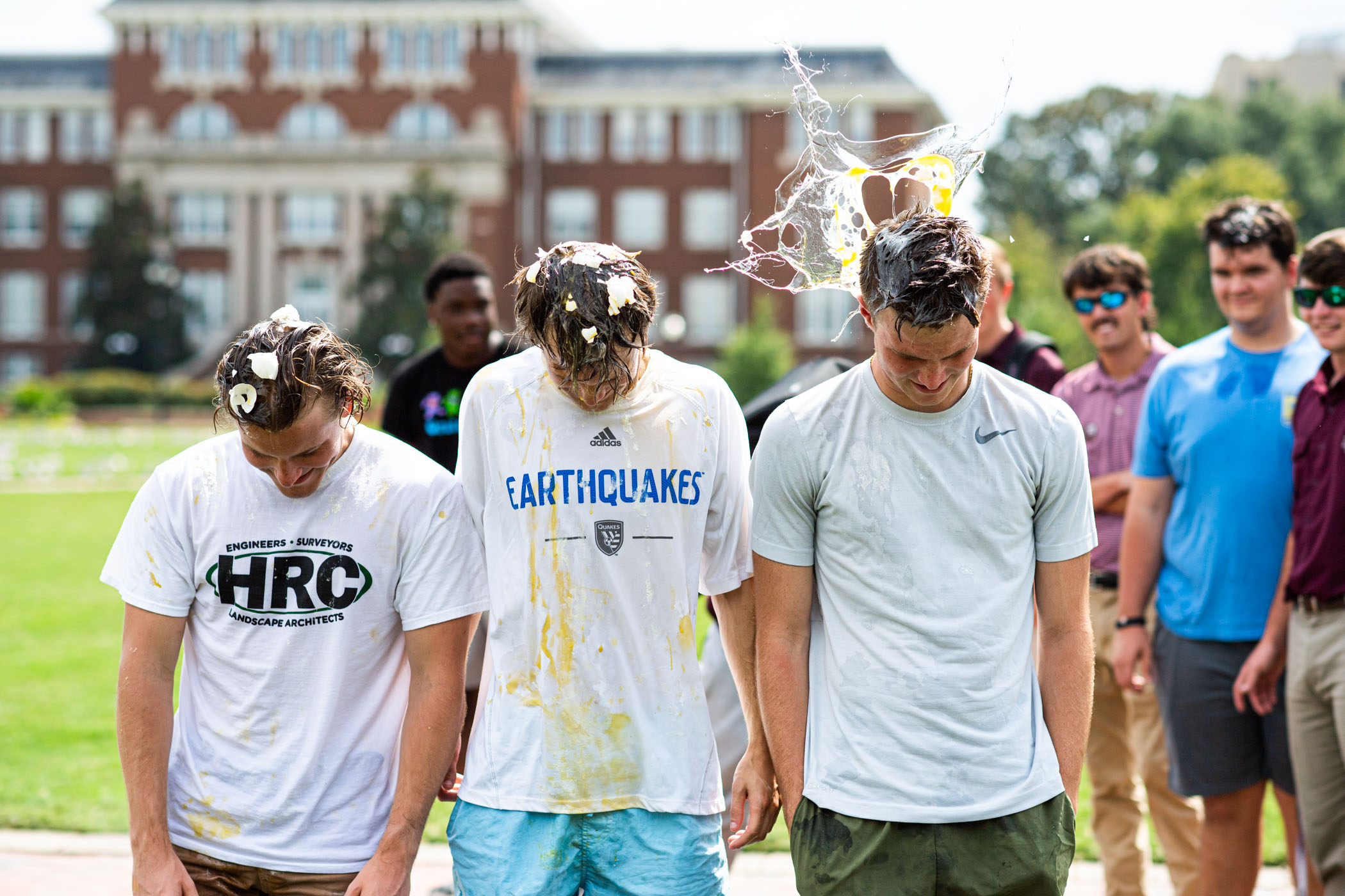 Participant in "Egg a Brother" gets a flying yolk to the head