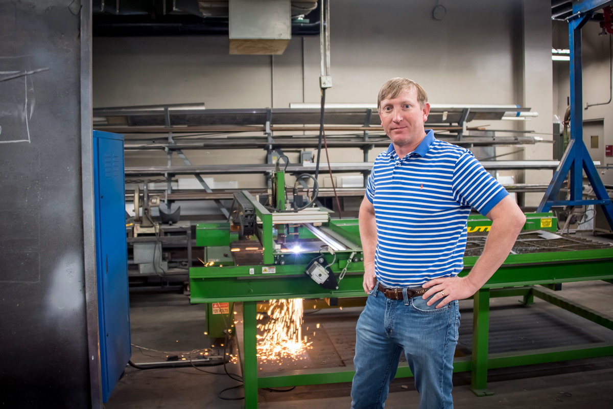 Wes Lowe stands in the Mississippi Agricultural and Forestry Experiment Station's machine shop.