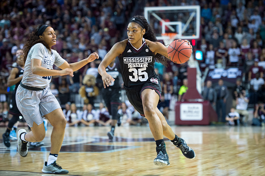 Victoria Vivians drives to the basketball goal against Ole Miss