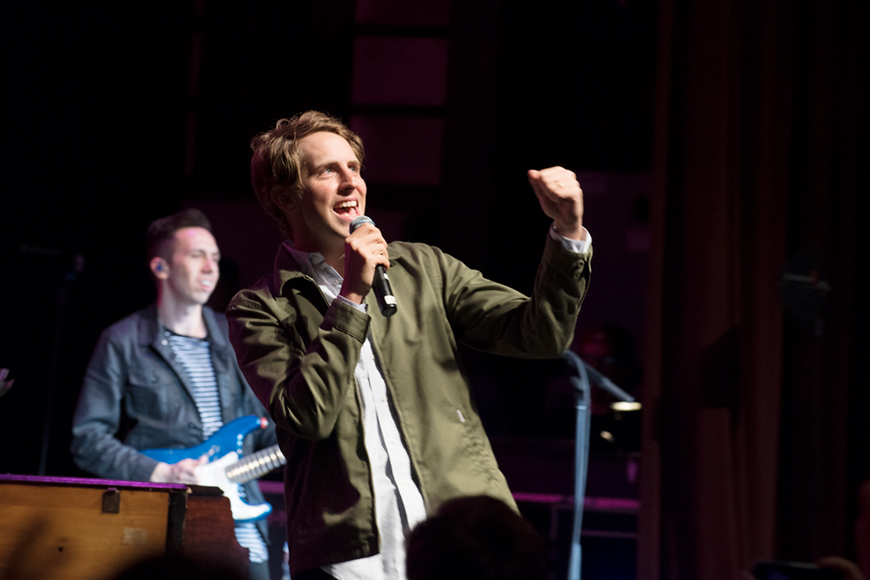 Singer performing pop music on stage