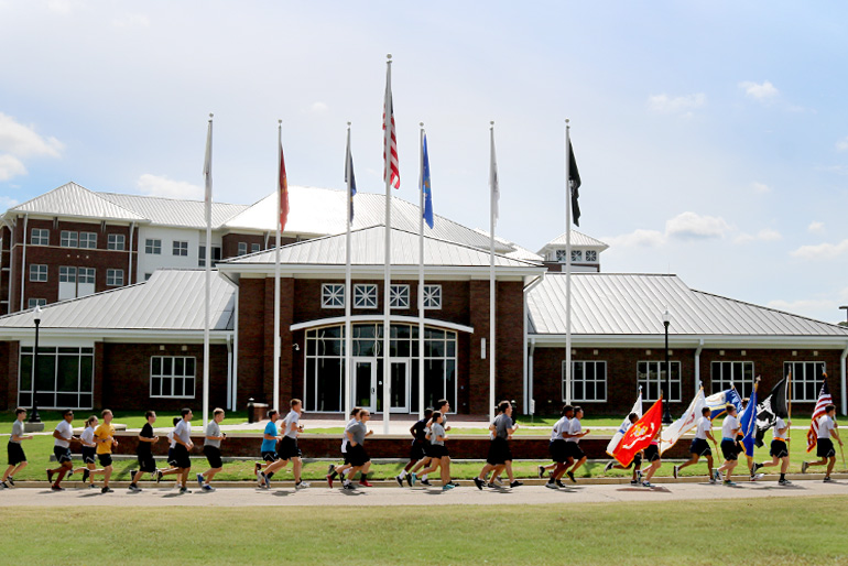 Air Force ROTC Detachment 425 running in front of the Center for America's Veterans
