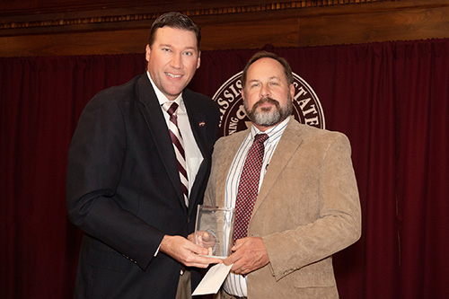 Jeff Davis, MSU Alumni Association executive director, is pictured with MSU Alumni Association Graduate Teaching Excellence Award recipient Brian Baldwin. MSU Alumni Association Executive Director Jeff Davis congratulates Brian Baldwin, recipient of the MSU Alumni Association’s Graduate Teaching Excellence Award. (Photo by Beth Wynn)
