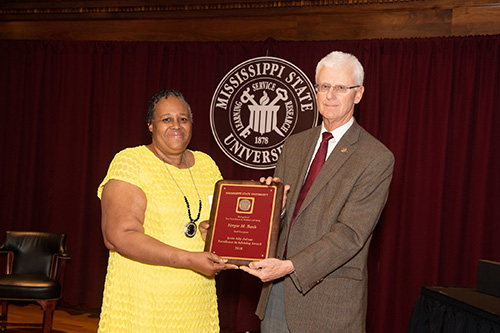 Irvin Atly Jefcoat Excellence in Advising Award recipient Vergie Bash is pictured with Peter Ryan, MSU associate provost for academic affairs. Peter Ryan, MSU associate provost for academic affairs, congratulates Vergie Bash, staff recipient of the Irvin Atly Jefcoat Excellence in Advising Award. (Photo by Beth Wynn)