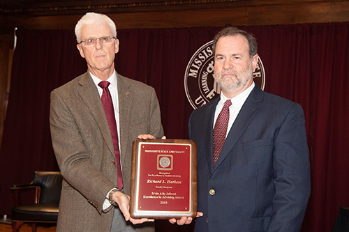 Peter Ryan, MSU associate provost for academic affairs, is pictured with Richard Harkess, faculty recipient of the Irvin Atly Jefcoat Excellence in Advising Award. Peter Ryan, MSU associate provost for academic affairs, congratulates Richard Harkess, faculty recipient of the Irvin Atly Jefcoat Excellence in Advising Award. (Photo by Beth Wynn)